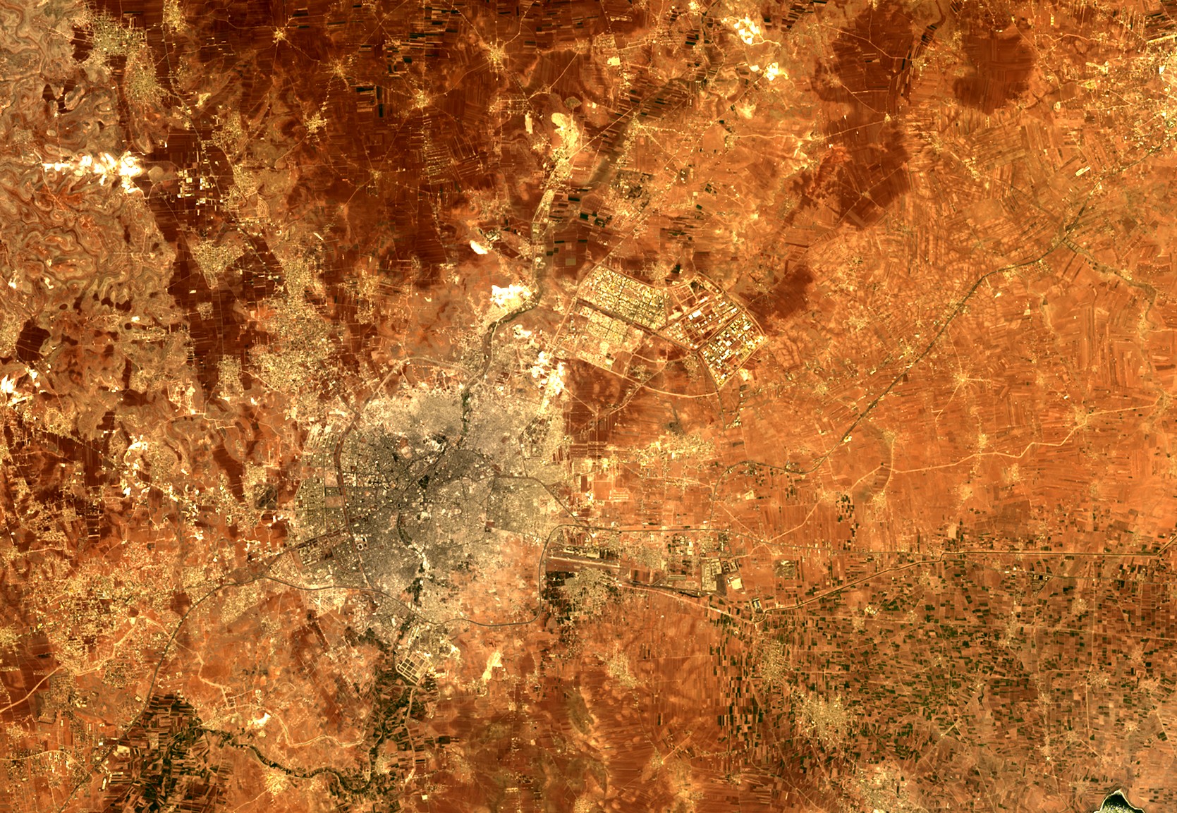 Aleppo and the Sheikh Najjar industrial city, daytime satellite view, 2025